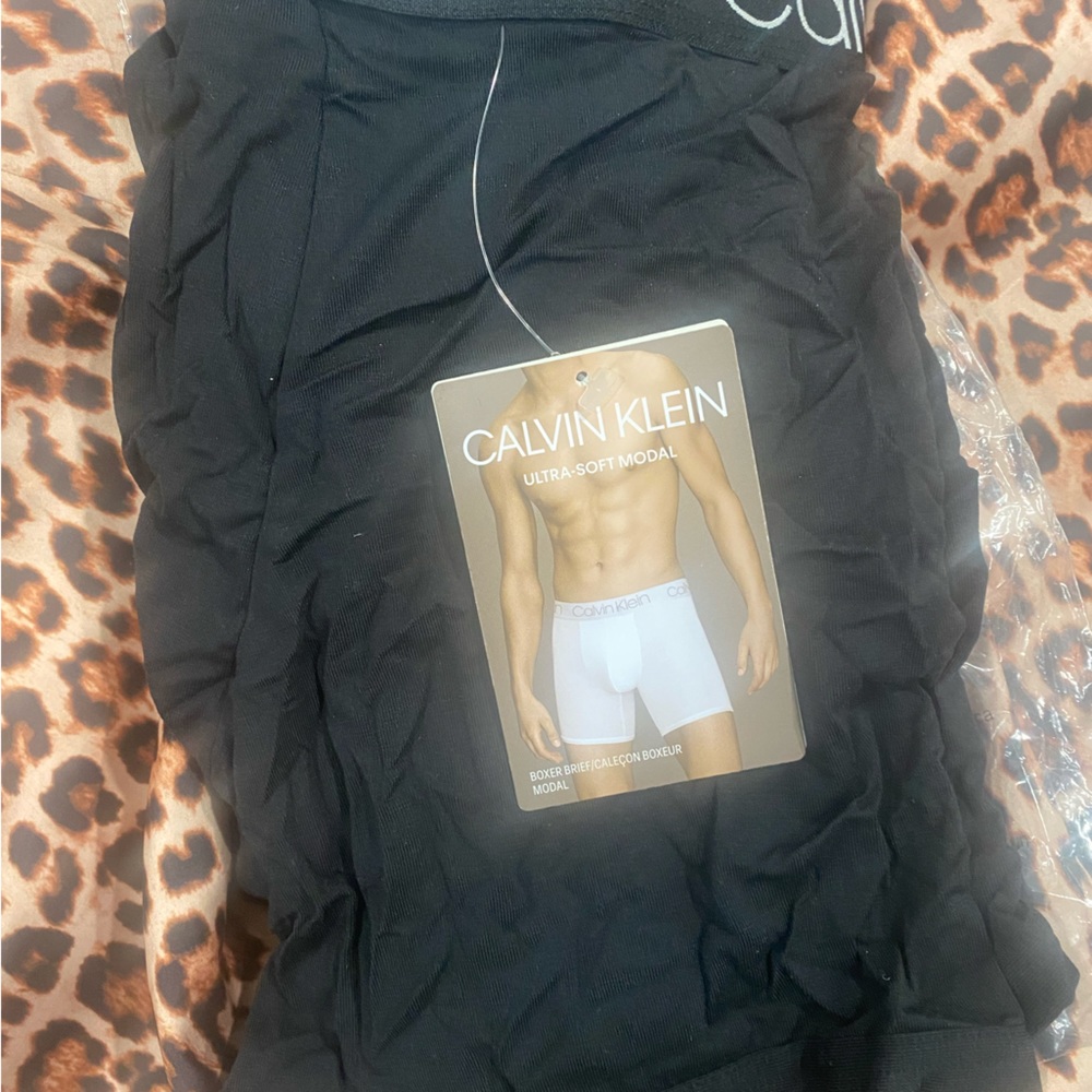 Men’s size M Calvin Klein Underwear (7 individually packaged in black)